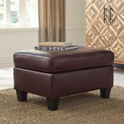 Fortney Mahogany Leather Ottoman - bellafurnituretv