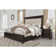 Brynhurst Dark Brown King Upholstered Panel Bed - bellafurnituretv